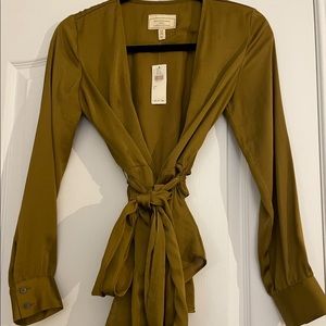 Gold silky wrap top from Anthropologie.